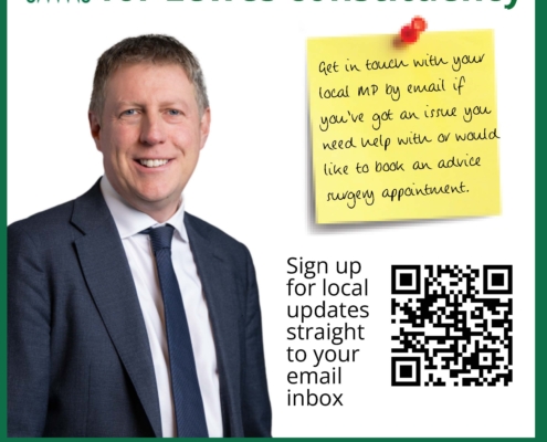 A campaign poster for James MacCleary MP, Member of Parliament for Lewes. It includes his photo, contact details, social media info, and a QR code to sign up for email updates. Text: “STANDING UP FOR YOU.”.