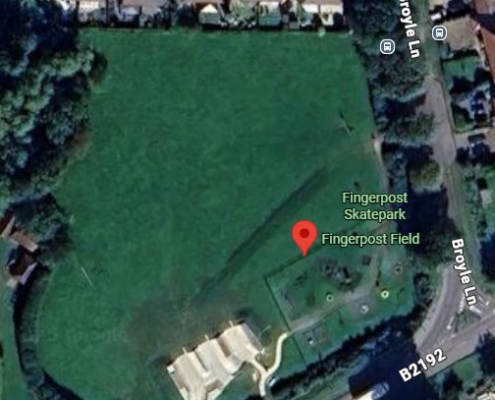 A satellite view of Fingerpost Field, showing a large green park area with a skatepark at the lower edge, surrounded by roads and houses. The location pin marks "Fingerpost Skatepark" and nearby streets are labeled.