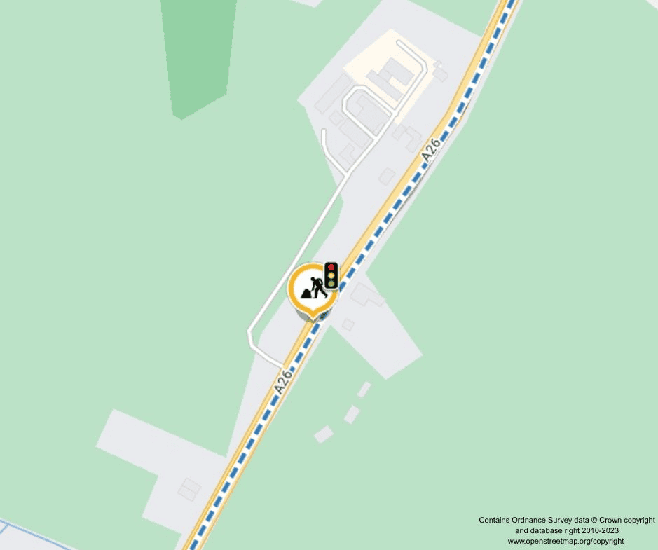 Map view of the A26 road featuring a traffic light icon and a roadworks warning symbol.